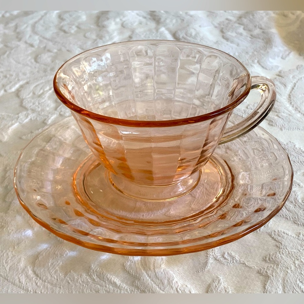 Pink Depression Glass cup and saucer